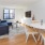 a living room with a couch and a table