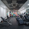 fitness center with free weights and machines